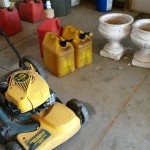 Okonski Push Lawnmower and gas tanks