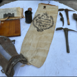 232- 1883 Bag, flask, Digging tools, Wooden Saddle